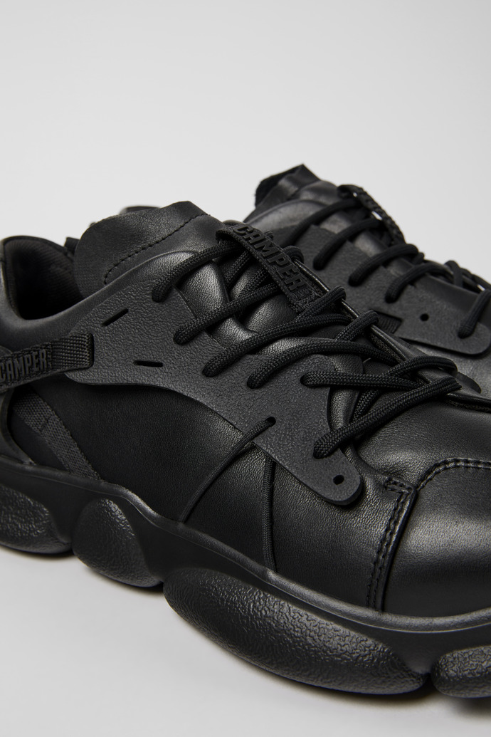 Close-up view of Karst Black leather and textile sneakers for men