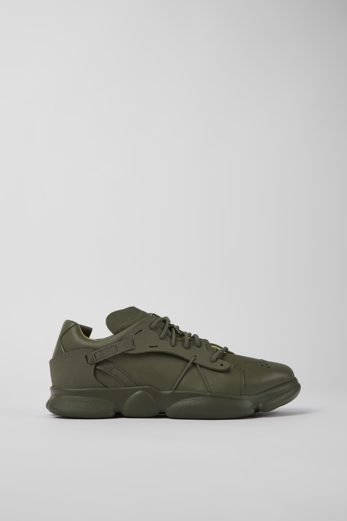 Side view of Karst Green leather and textile sneakers for men