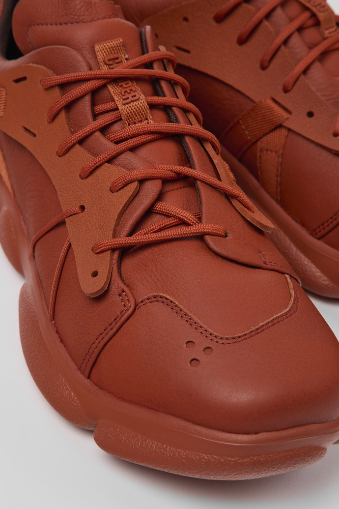 Close-up view of Karst Red leather and textile sneakers for men