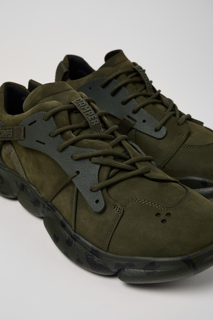 Close-up view of Karst Green nubuck and textile sneakers for men