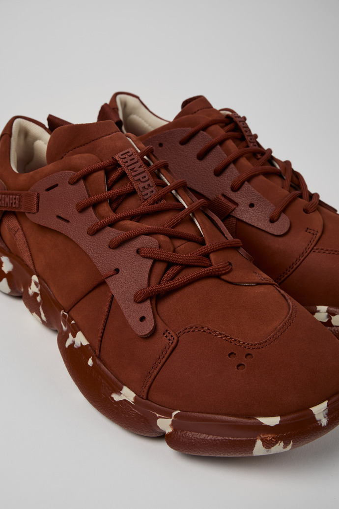 Close-up view of Karst Red nubuck and textile sneakers for men