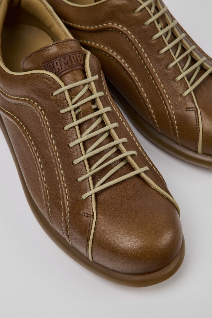 Close-up view of Pelotas Brown leather sneakers for men