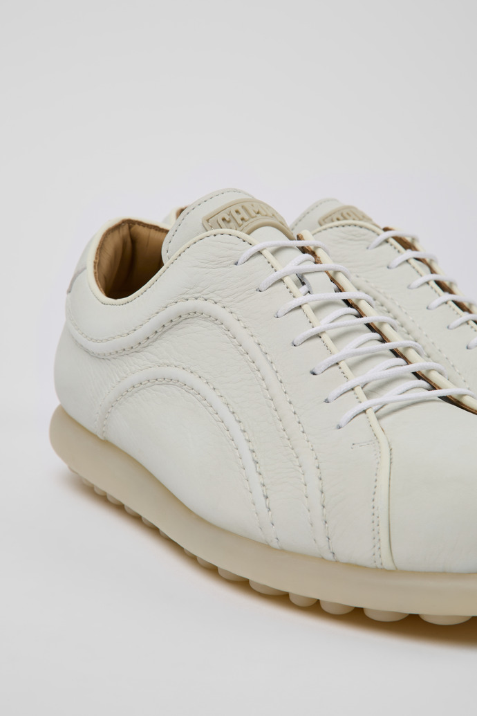 Close-up view of Pelotas White non-dyed leather sneakers for men