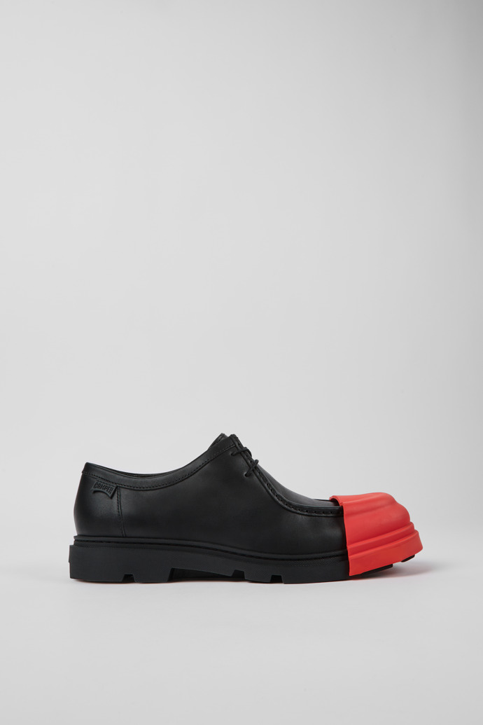 Image of Side view of Junction Black leather shoes for men