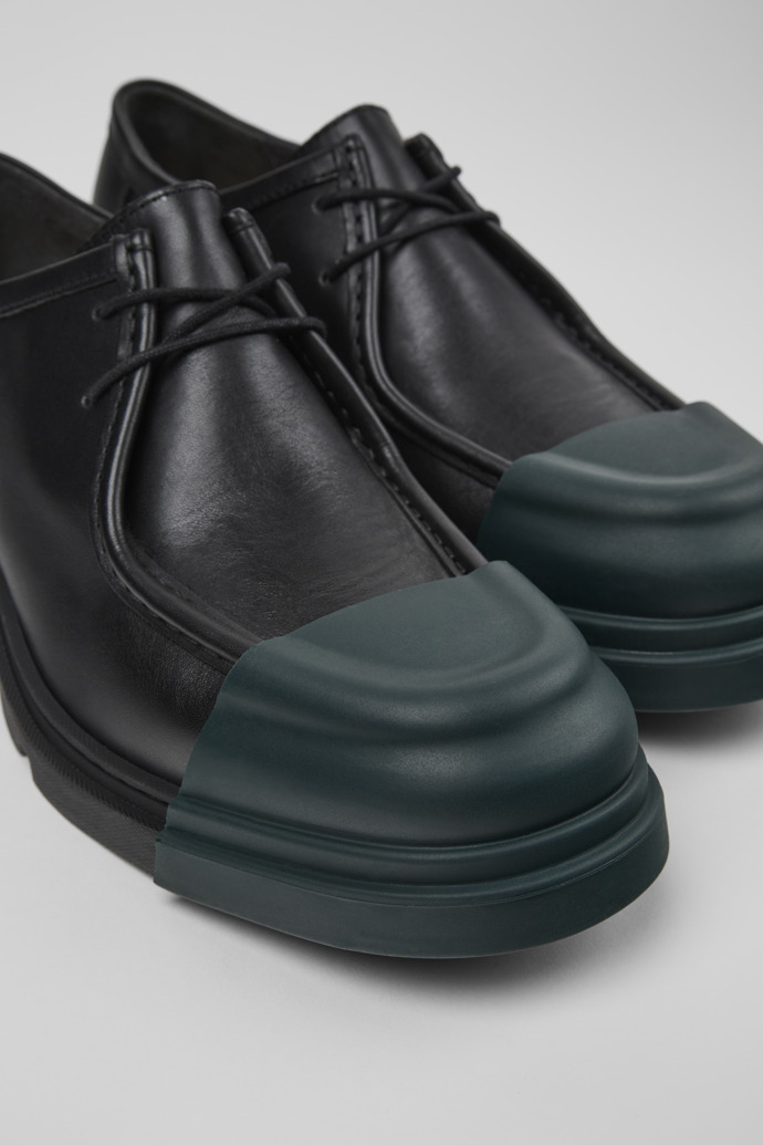 Close-up view of Junction Black leather shoes for men