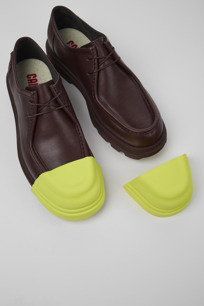 A model wearing Junction Burgundy leather shoes for men