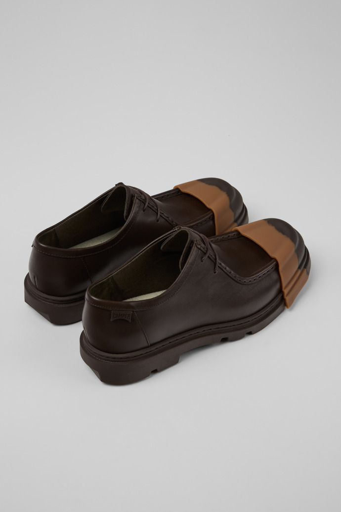 Junction Chaussures pour homme en cuir marron.