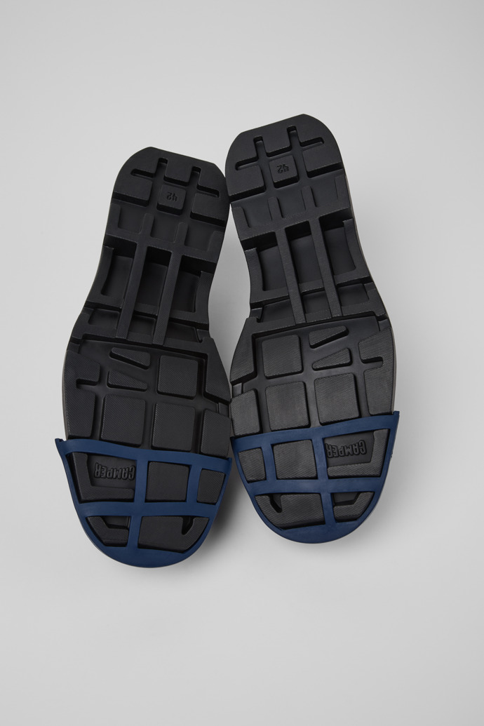 The soles of Junction Black Leather Shoes for Men.