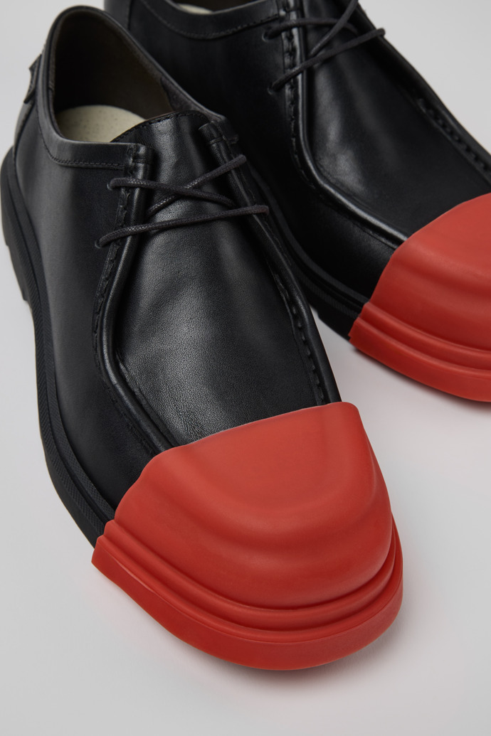 Close-up view of Junction Black Leather Shoes for Men.