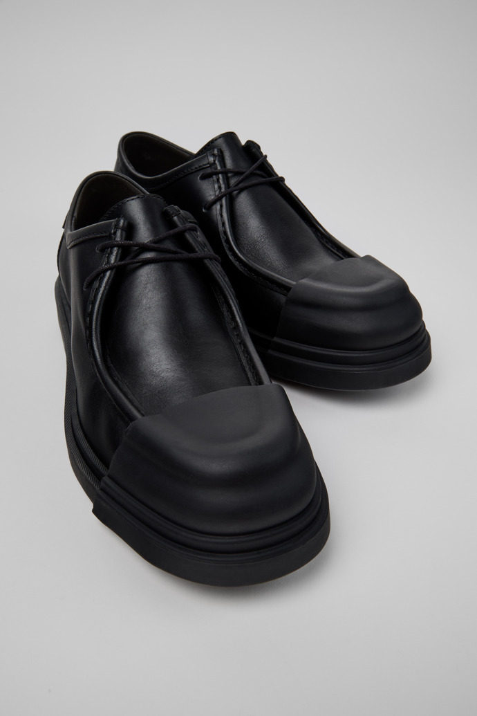 Close-up view of Junction Black Leather Shoes for Men.
