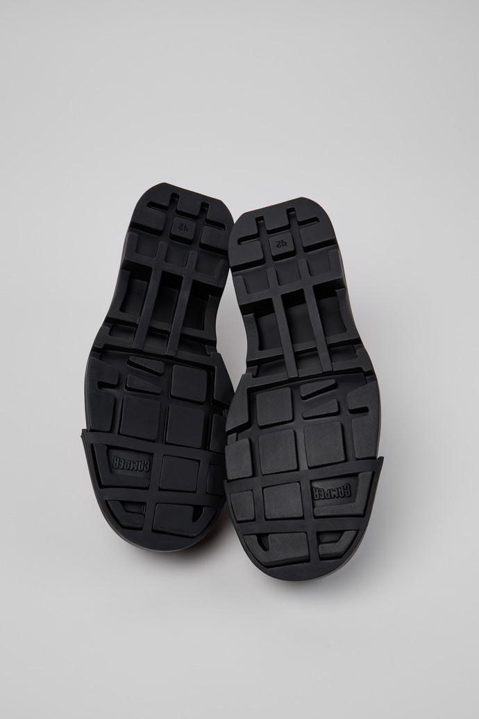 The soles of Junction Black Leather Shoes for Men.