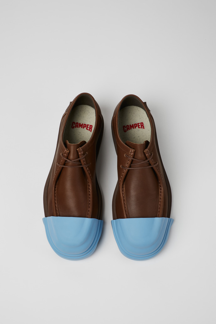 Junction Chaussures en cuir marron Pour homme.