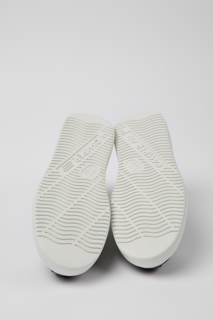 The soles of Runner K21 MIRUM® Black and white sneakers for men