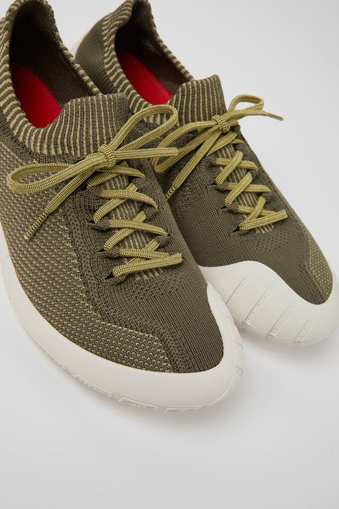 Close-up view of Path Green and yellow textile sneakers for men