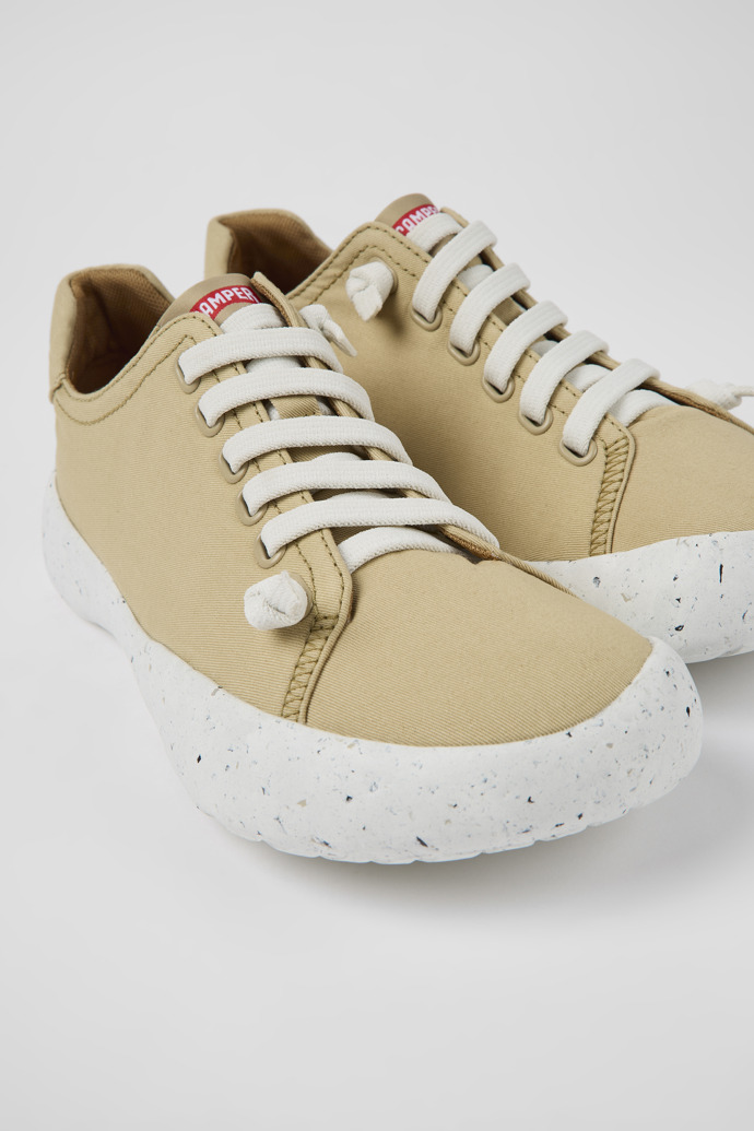 Close-up view of Peu Stadium Beige textile sneakers for men