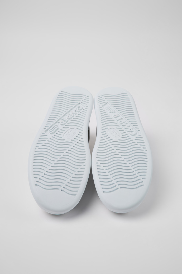 The soles of Runner White leather sneakers for men