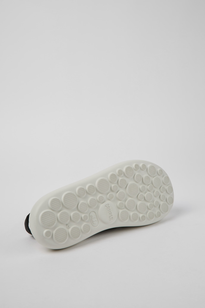 The soles of Pelotas Flota HyphaLite™ Black and white HyphaLite™ sandals for men