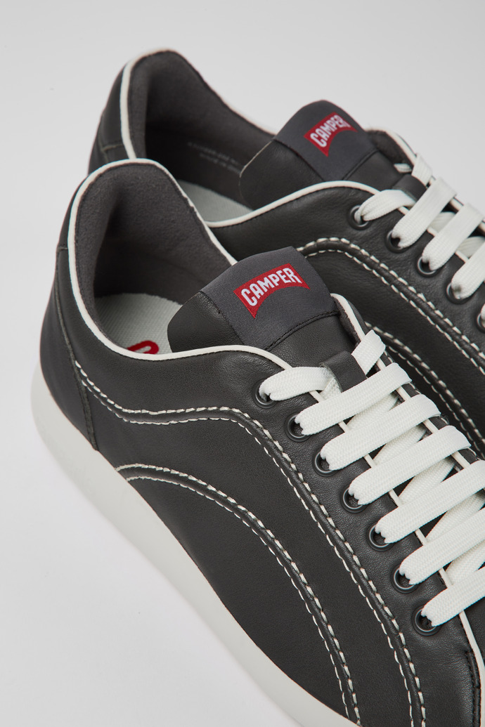 Close-up view of Pelotas XLite Dark gray leather sneakers for men