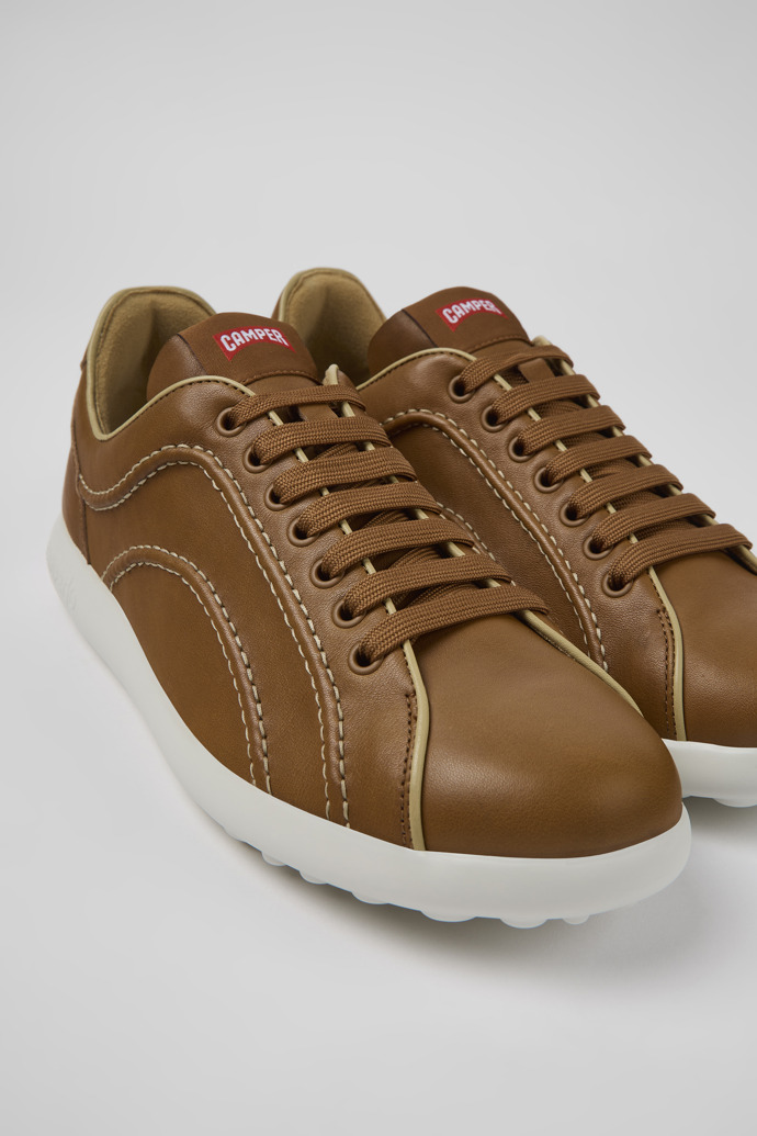 Close-up view of Pelotas XLite Brown leather sneakers for men