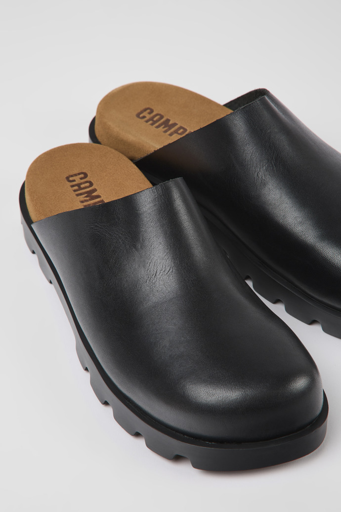 Close-up view of Brutus Sandal Black leather clogs for men
