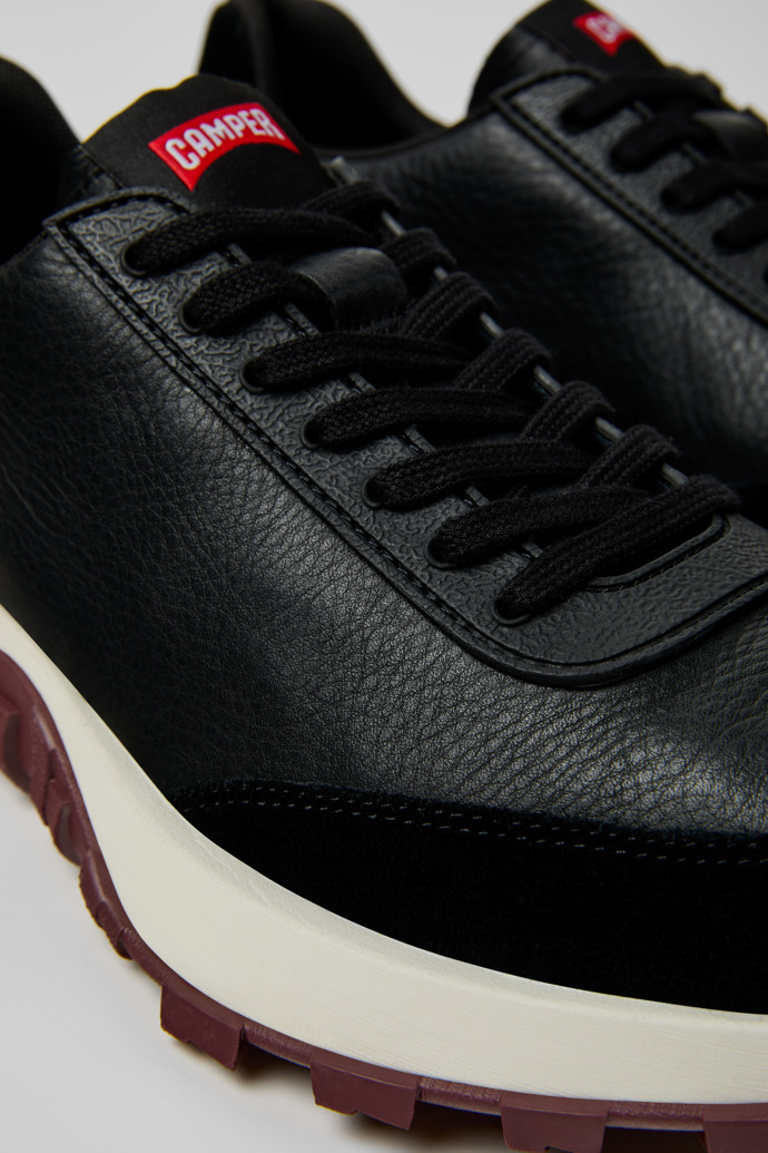 Close-up view of Drift Trail Black Leather and Nubuck Sneakers for Men.