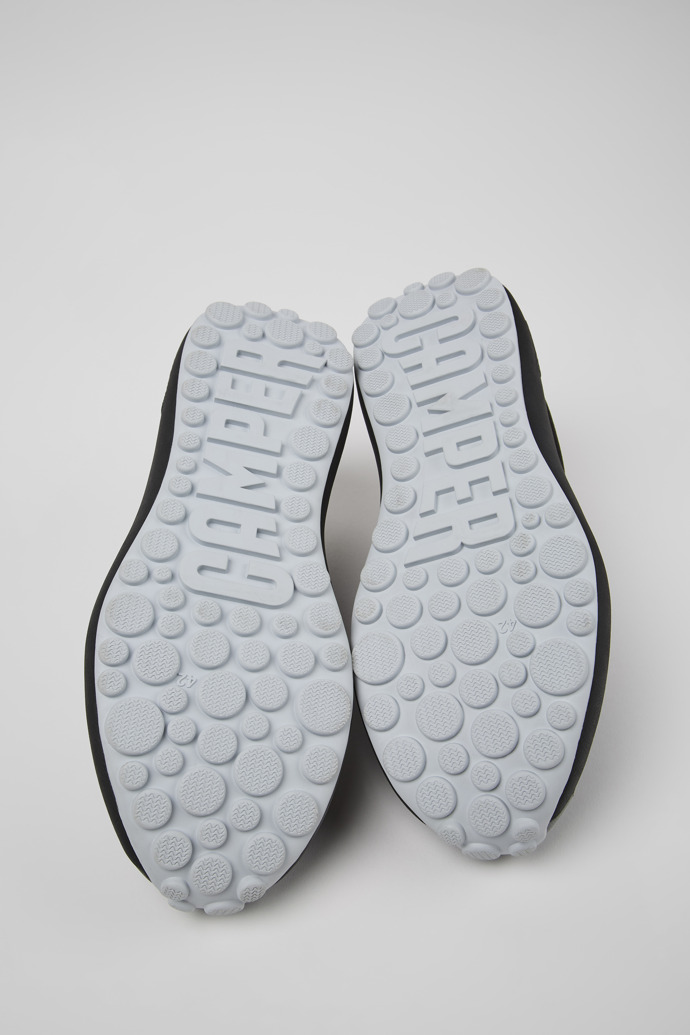 The soles of Pelotas Athens Black Textile Sneaker for Men