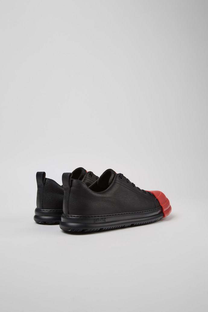 มุมมองด้านหลังของ Junction Runner Black Leather Sneakers for Men.