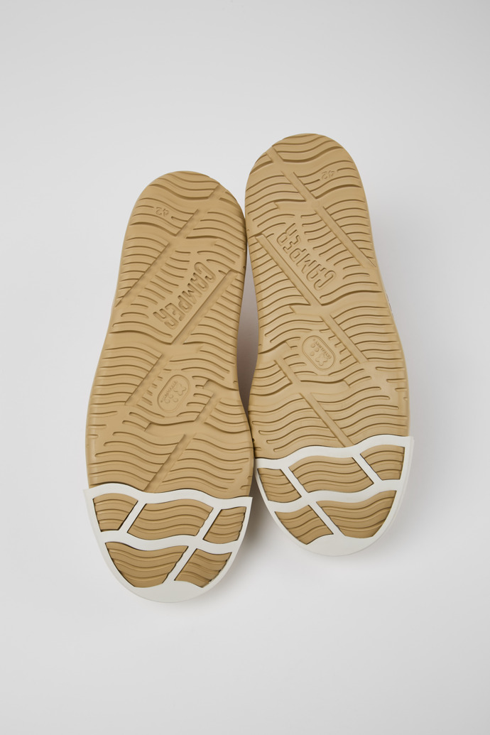 The soles of Junction Runner Beige Nubuck Men's Sneakers.