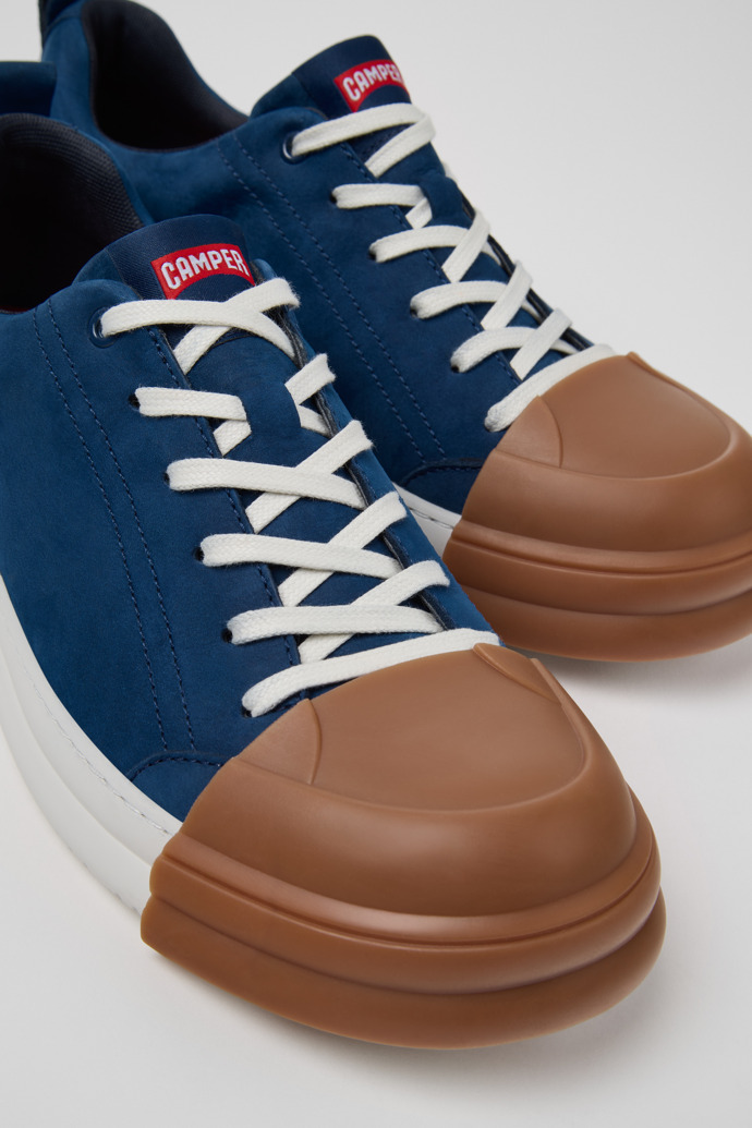 Close-up view of Junction Runner Blue Nubuck Sneakers for Men.