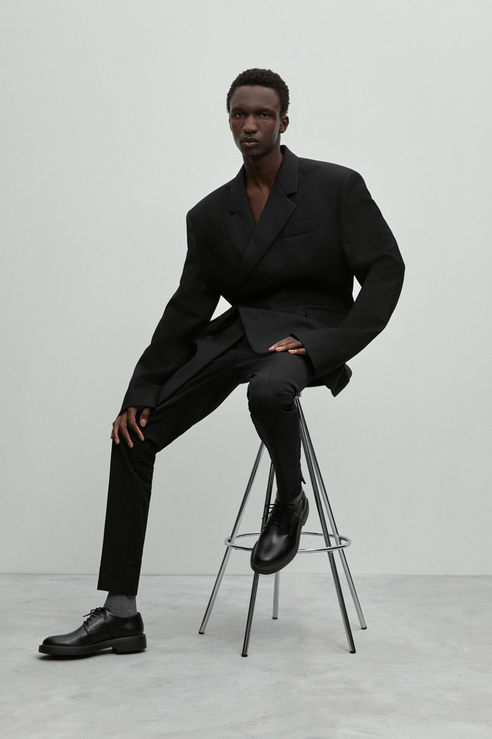 A model wearing Dean Black leather shoes for men