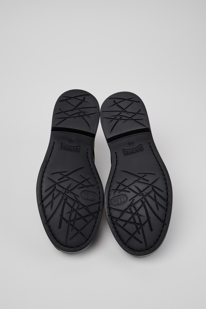 The soles of Twins Black Leather Shoes for Men.