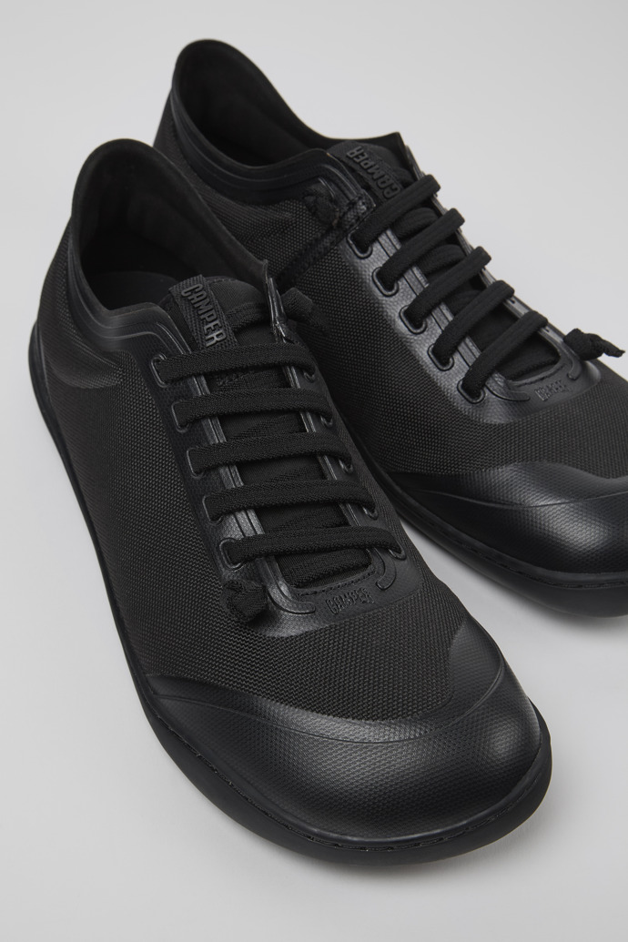 Close-up view of Peu Black textile shoes for men