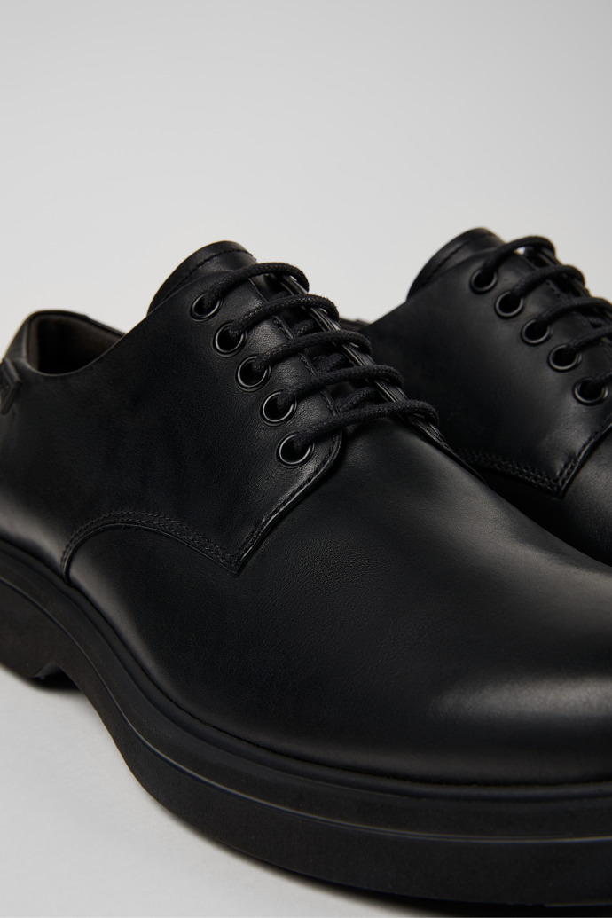 Close-up view of Norman Black Leather Men's Shoes.