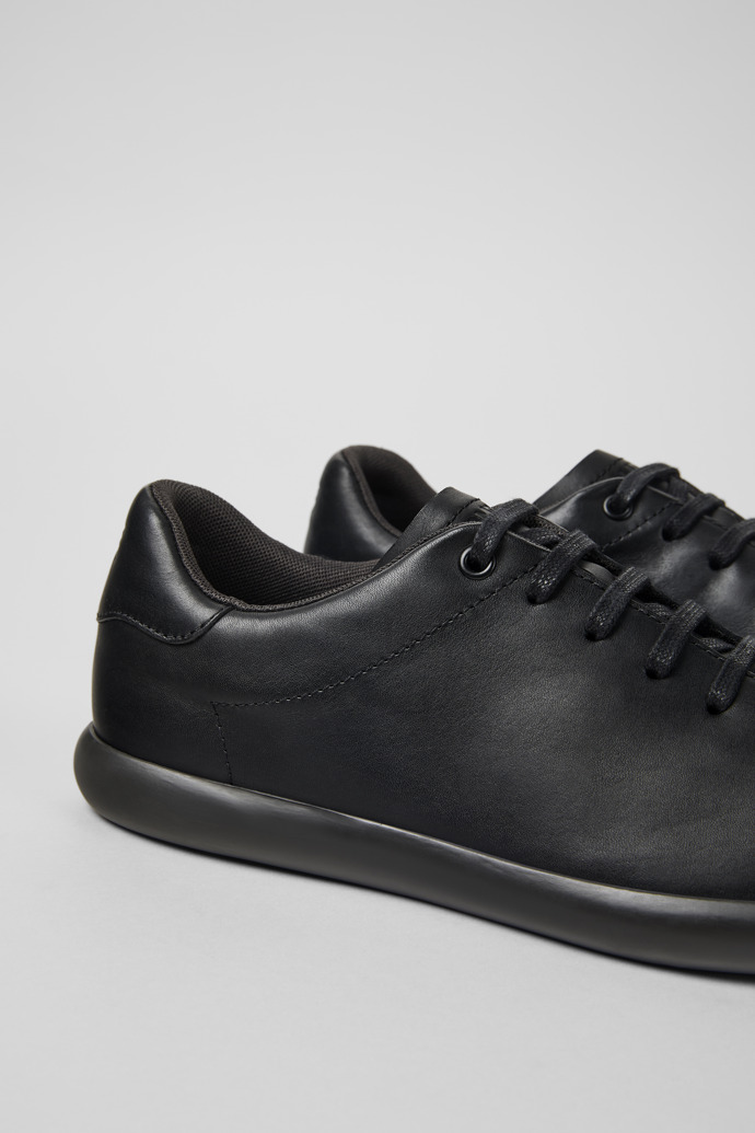 Close-up view of Pelotas Soller Black leather sneakers for men