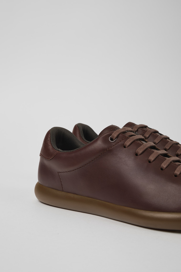 Close-up view of Pelotas Soller Brown leather sneakers for men