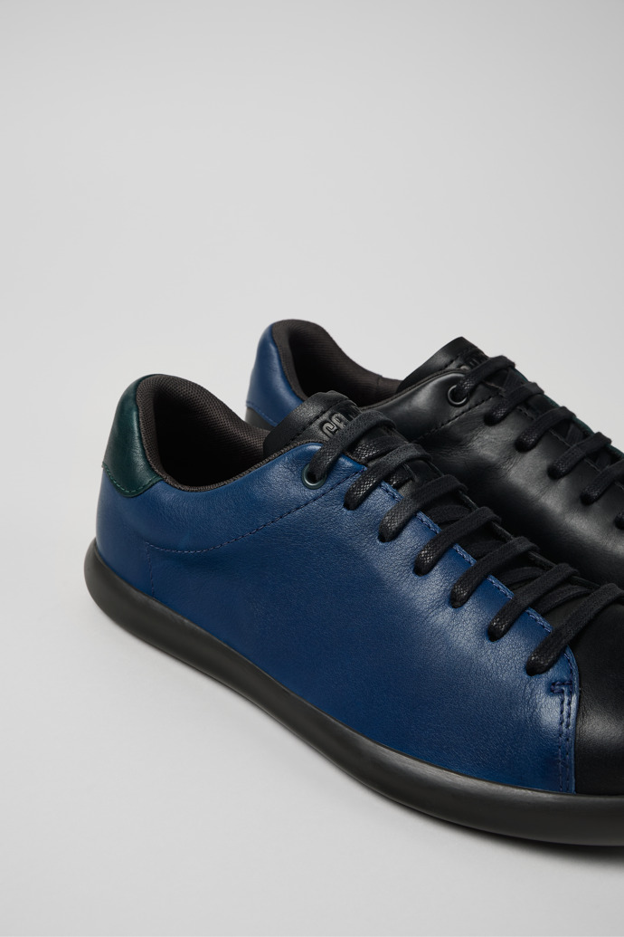 Close-up view of Twins Black and blue leather sneaker for men