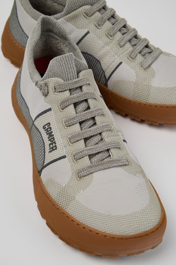 Close-up view of Peu Serra Gray and white Engineered Material Sneakers for Men.