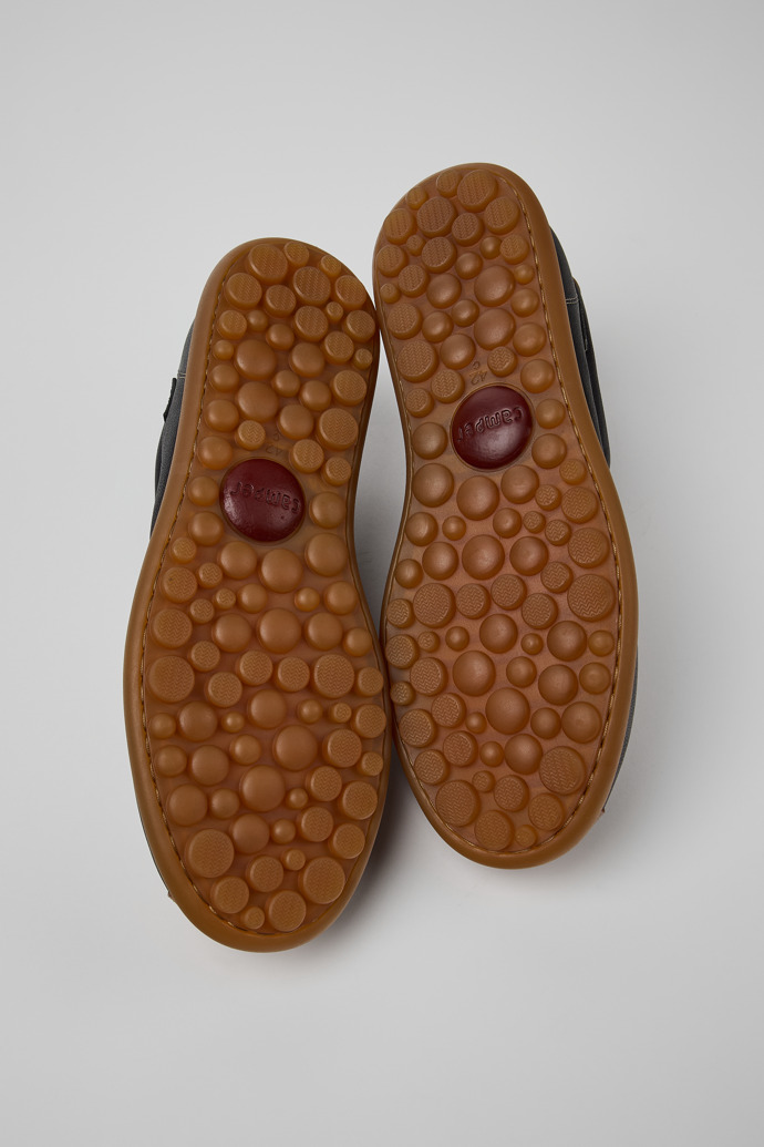 The soles of Pelotas Multicolor Leather Shoes for Men.