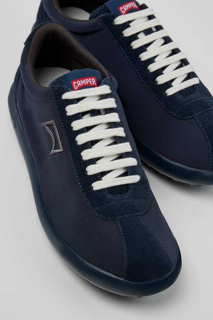 Close-up view of Pelotas XLite Blue Recycled PET and Nubuck Men's Sneakers.