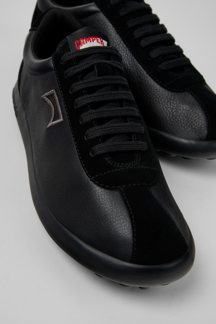 Close-up view of Pelotas XLF Black Leather and Nubuck Sneakers for Men.