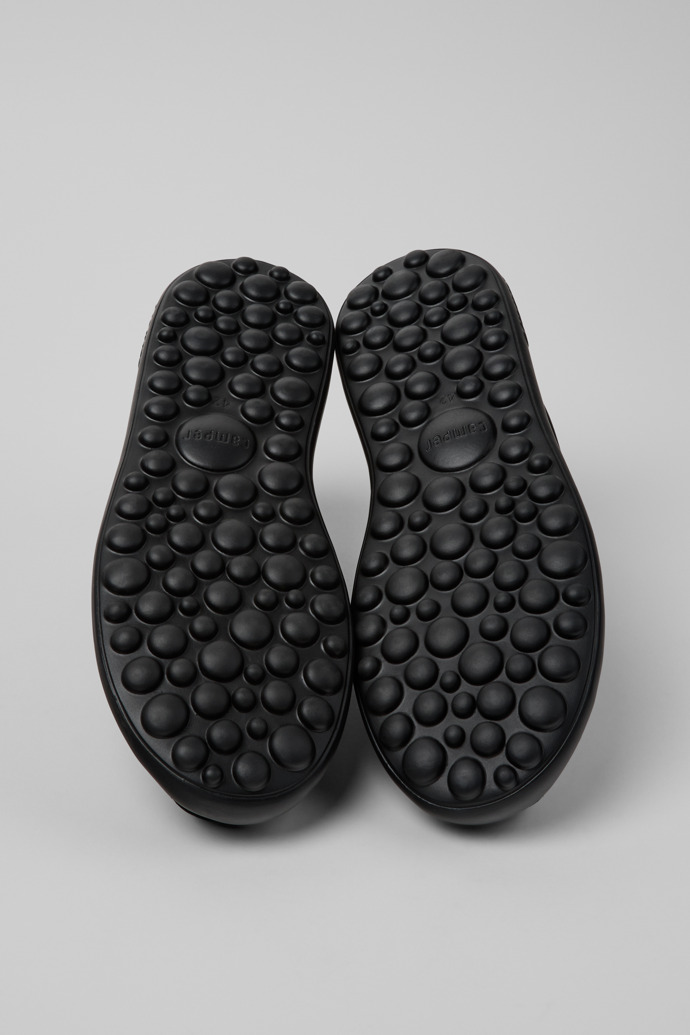 The soles of Pelotas XLF Black Leather and Nubuck Sneakers for Men.
