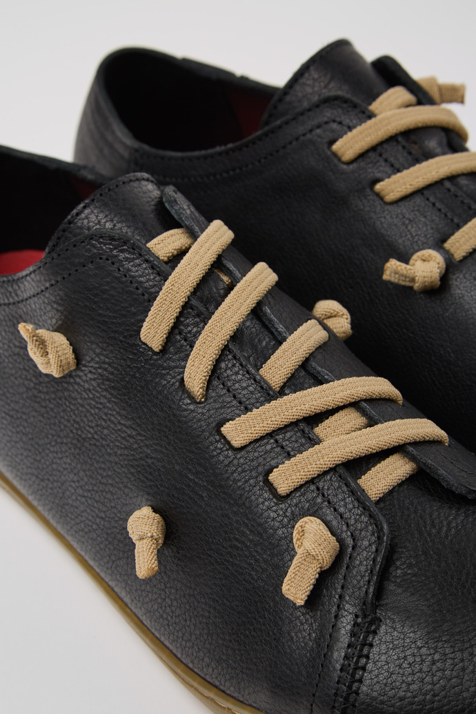 Close-up view of Twins Black Leather Men's Shoe.