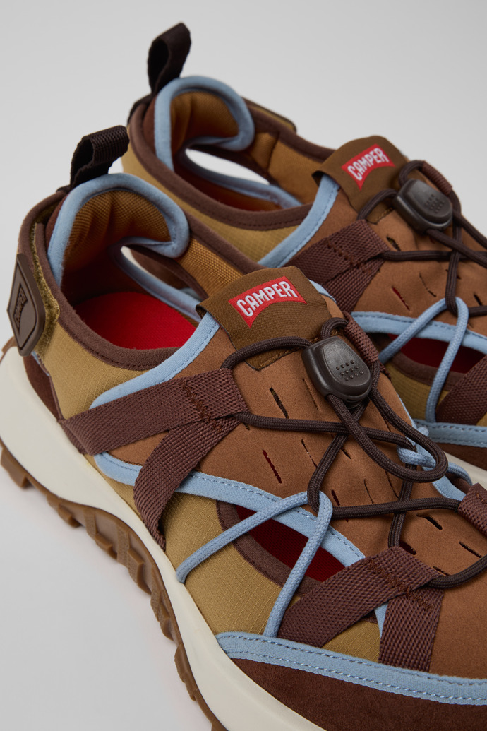 Close-up view of Drift Trail Brown Textile and Nubuck Leather Sneakers for Men.