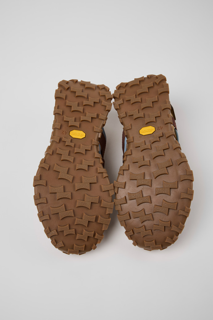 The soles of Drift Trail Brown Textile and Nubuck Leather Sneakers for Men.