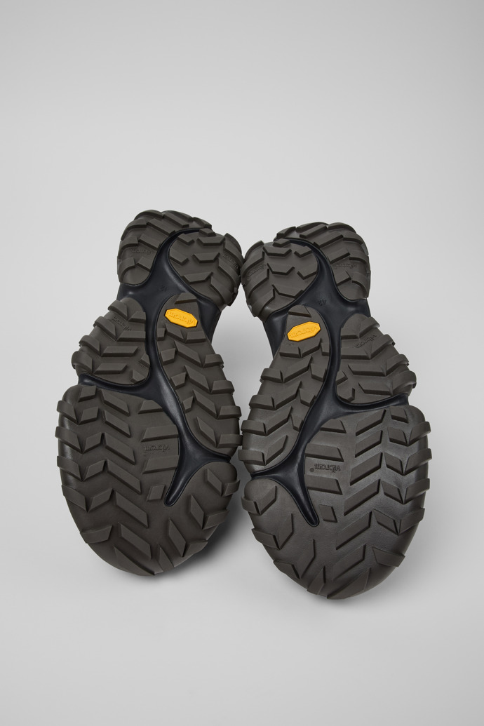 The soles of Karst Trek - GORE-TEX Multicolor Textile and Nubuck Sneakers for Men.