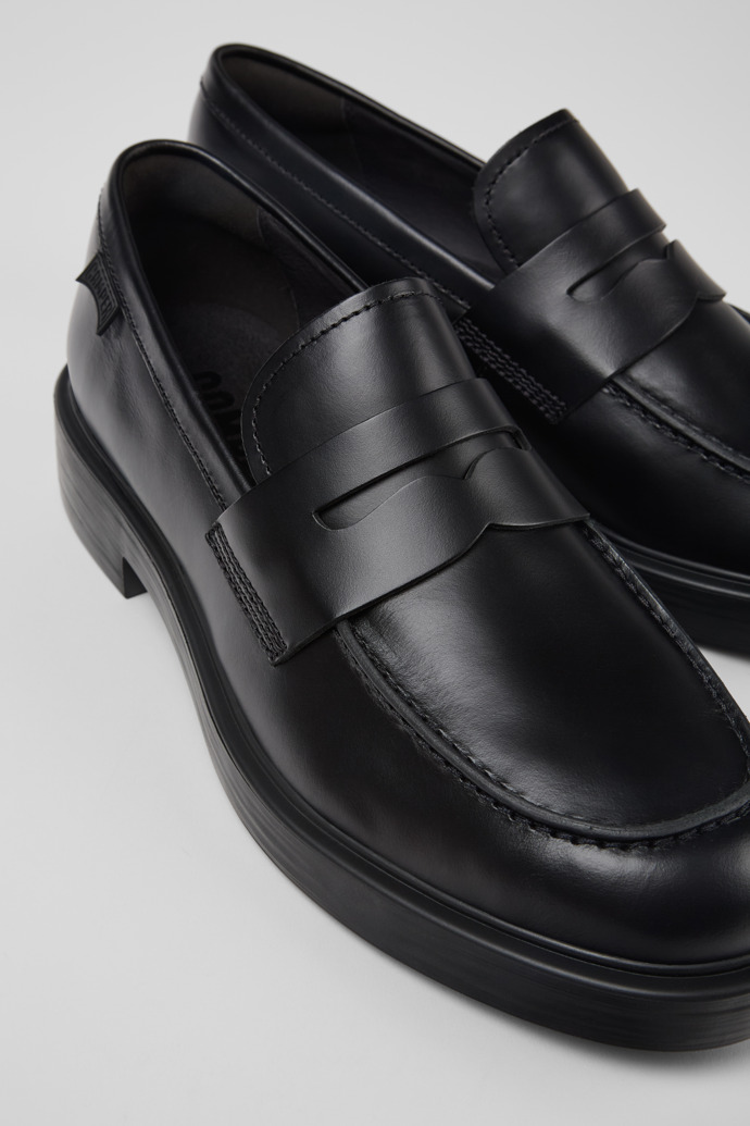 Close-up view of Dean Black Leather Moccasins for Men.