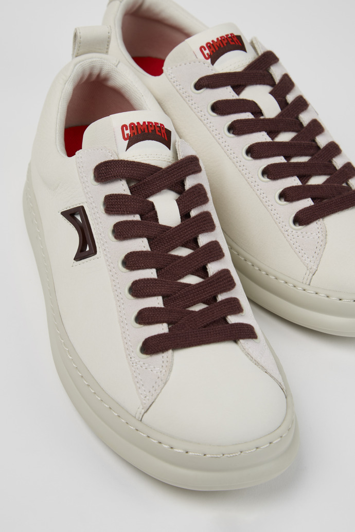 Close-up view of Runner White Leather and Nubuck Sneakers for Men.