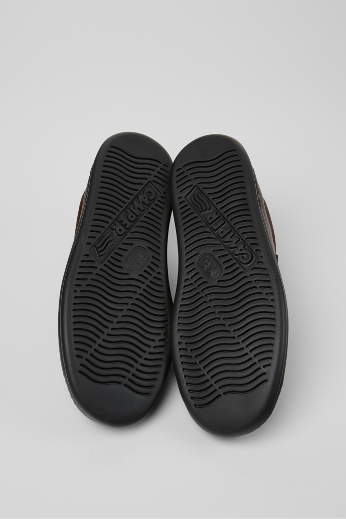 The soles of Runner Brown Leather Sneakers for Men.