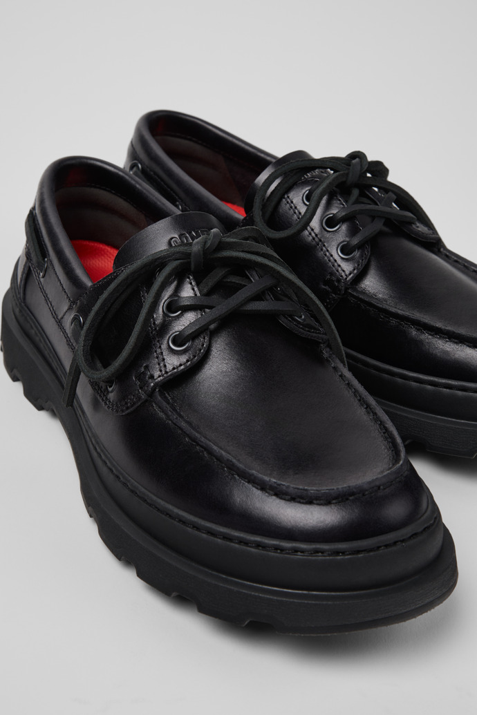 Close-up view of Brutus+ Black Leather Moccasins for Men.