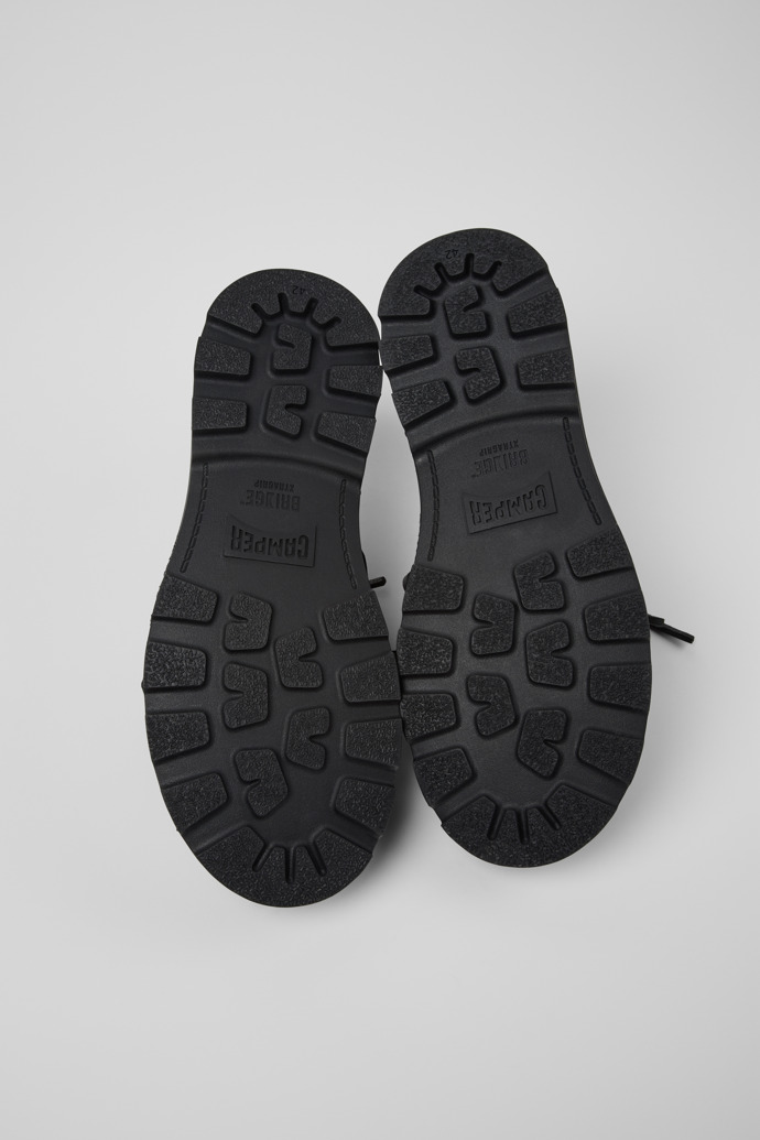The soles of Brutus+ Black Leather Moccasins for Men.